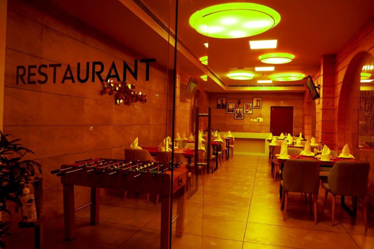 Hotel New York Square Kottayam Bagian luar foto